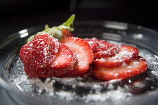 Close-up of sliced strawberries in a bowl
