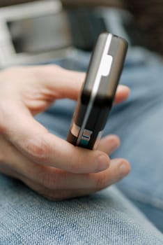 Close-up of a personŽs hand holding a mobile phone