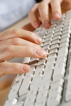 Close-up of a personŽs hand using a computer keyboard