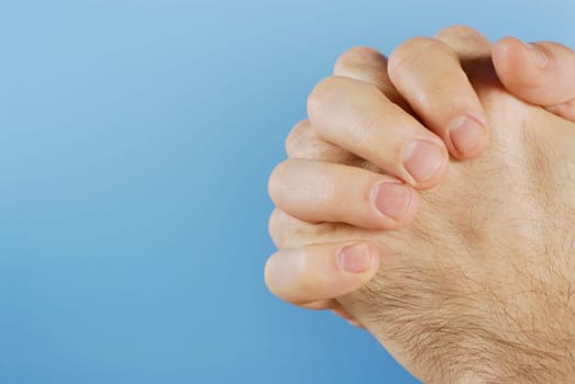 Close-up of personŽs hands clasped