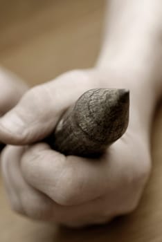 Close-up of a personŽs hand using a wood planer