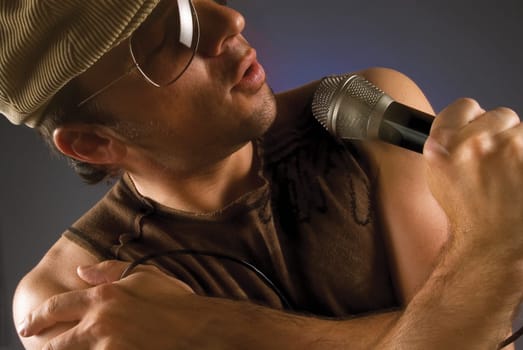 Close-up of a male singer singing