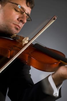 Close-up of a musician playing a violin