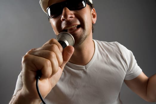 Close-up of a male singer singing