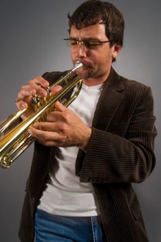 Close-up of a musician playing a trumpet