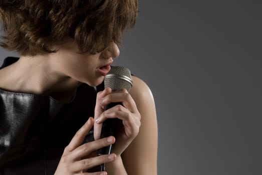 Close-up of a female singer singing