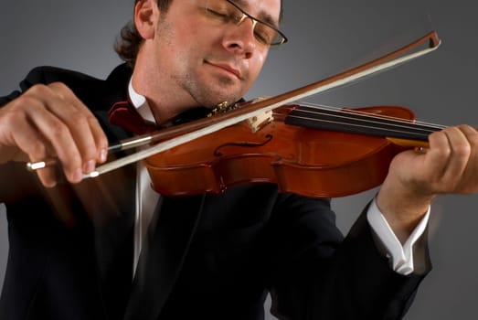 Close-up of a musician playing a violin