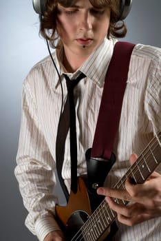 Close-up of a guitarist playing a guitar