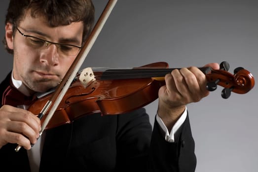 Close-up of a musician playing a violin