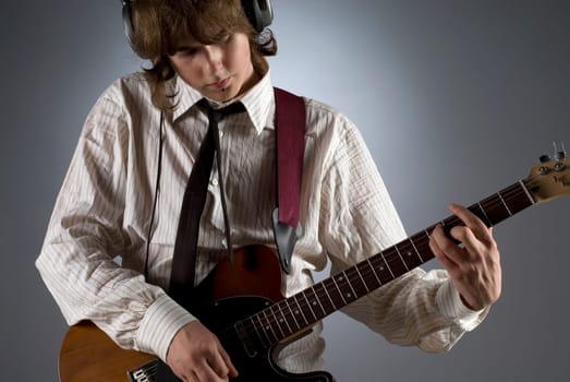 Close-up of a guitarist playing a guitar