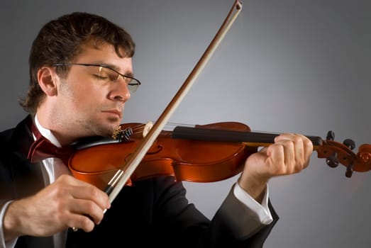 Close-up of a musician playing a violin