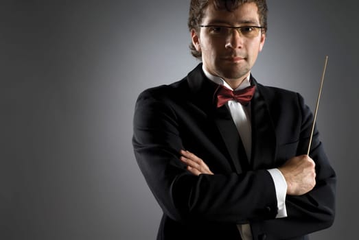 Close-up of a musician holding a conductorŽs baton