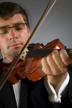 Close-up of a musician playing a violin