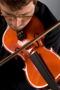 Close-up of a musician playing a violin