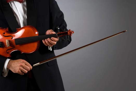 Close-up of a musician playing a violin