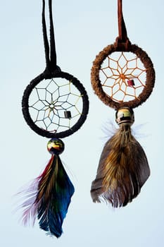 Close-up of two ornaments hanging