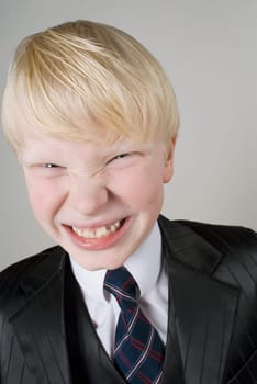 Close_up of a boy clenching his teeth