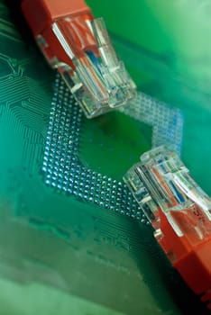 Close_up of two computer cables on a mother board