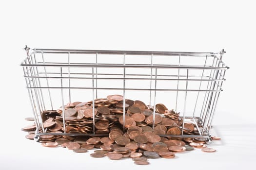 Close_up of coins in a metal basket