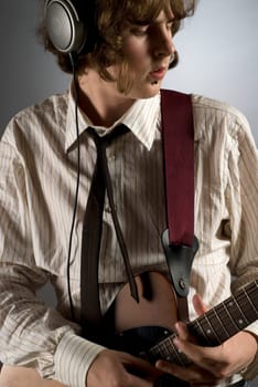 Close-up of a guitarist playing a guitar