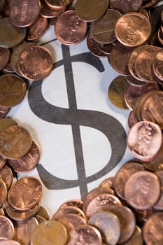 Close_up of coins with dollar sign