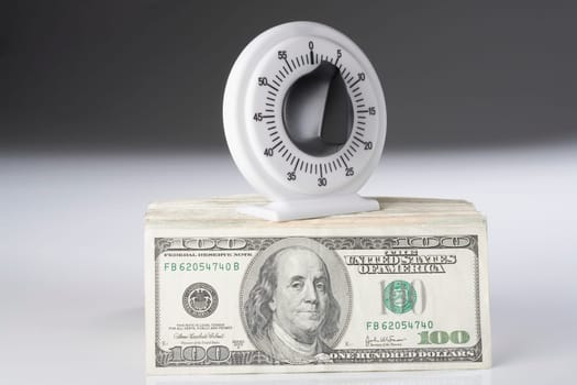 Close_up of a knob on a bundle of paper currency