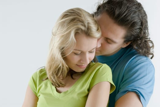 Close_up of a young couple romancing