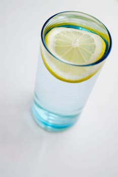 High angle view of a slice of lemon in a glass