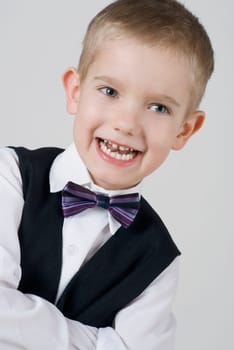 Close_up of a boy laughing
