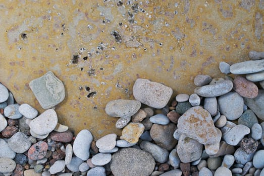 Close_up of pebbles on rock surface