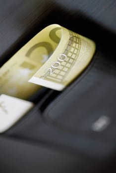 Close-up of two hundred Euro banknote in a wallet