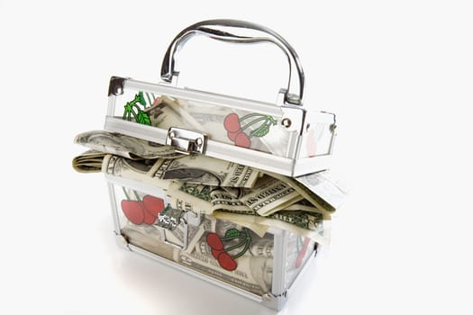 Close-up of a transparent box filled with paper currency