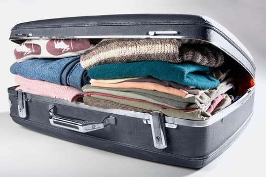 Close-up of a suitcase full of clothes