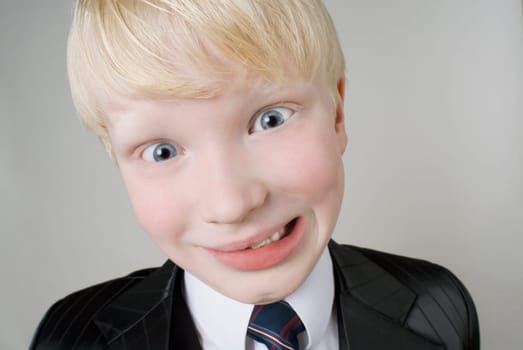 Close_up of a boy making a face