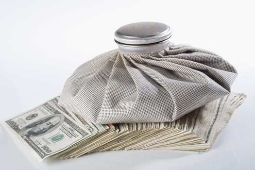 Close_up of an icebag on US paper currency