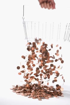 Coins draining from a metal basket