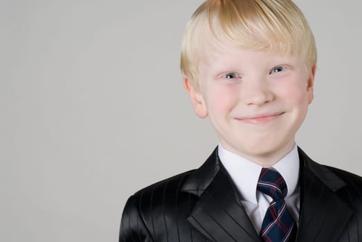 Close_up of a boy smiling