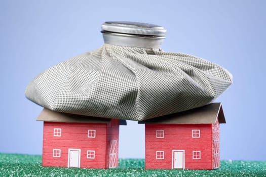 Bag of coins on model homes