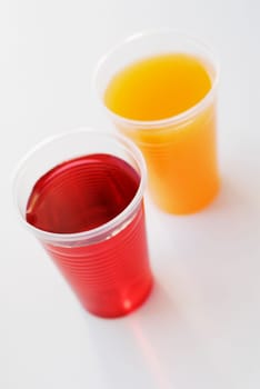 High angle view of two glasses of juice