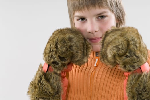 Portrait of a boy imitating to be a boxer