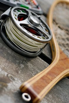 High angle view of a fishing reel and a fishing net