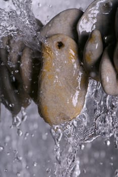 Stack of pebbles in water