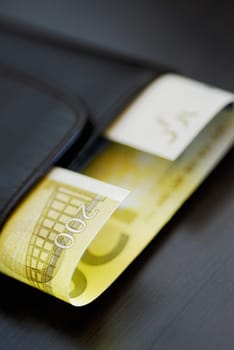 Close-up of two hundred Euro banknote in a wallet