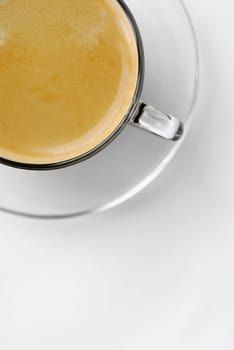 High angle view of a cup of coffee on a saucer
