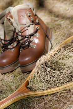 High angle view of a pair of shoes and a fishing net