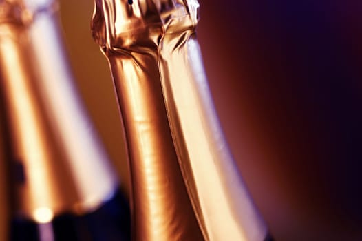 Close-up of two champagne bottles
