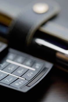 Close-up of a mobile phone with a diary