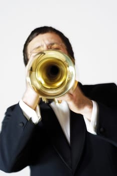 Close-up of a musician playing the trumpet