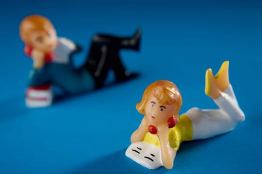 Close-up of two figurines
