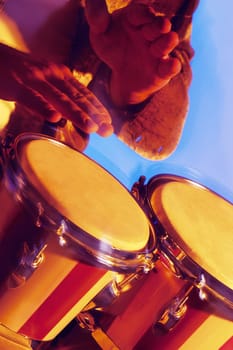 Close-up of a musician playing the bongo